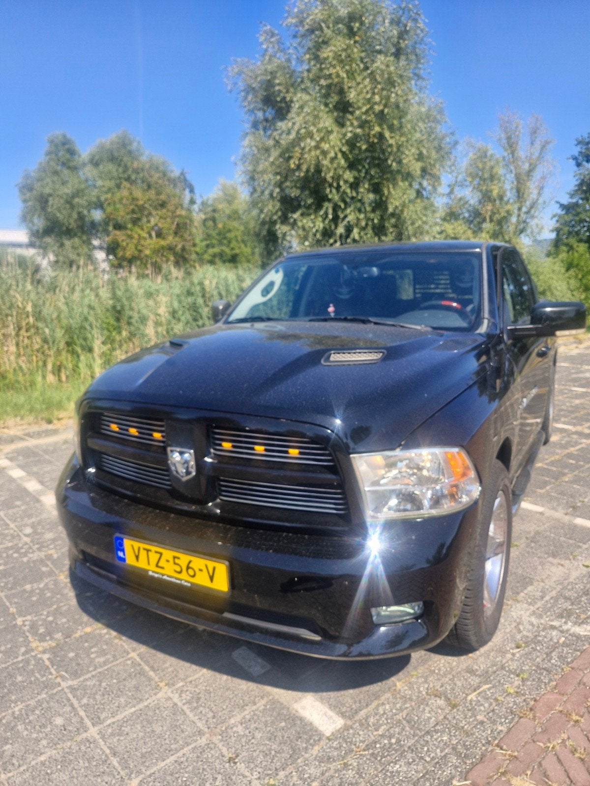 mooie stoere schadevrije dodge ram 1500 sport, Automaat, 397 pk, Zwart, Leder
