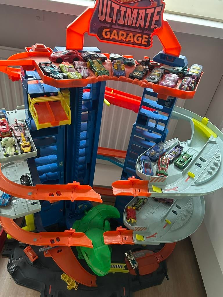 Hot Wheels City Robot T-Rex Ultimate Garage excl autos, Ophalen of Verzenden, Zo goed als nieuw, Handmatig, Hot Wheels