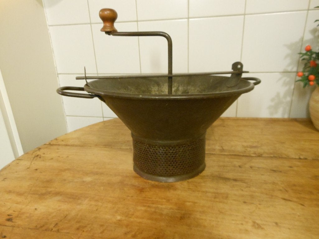 oud ijzeren draaizeef, Ophalen