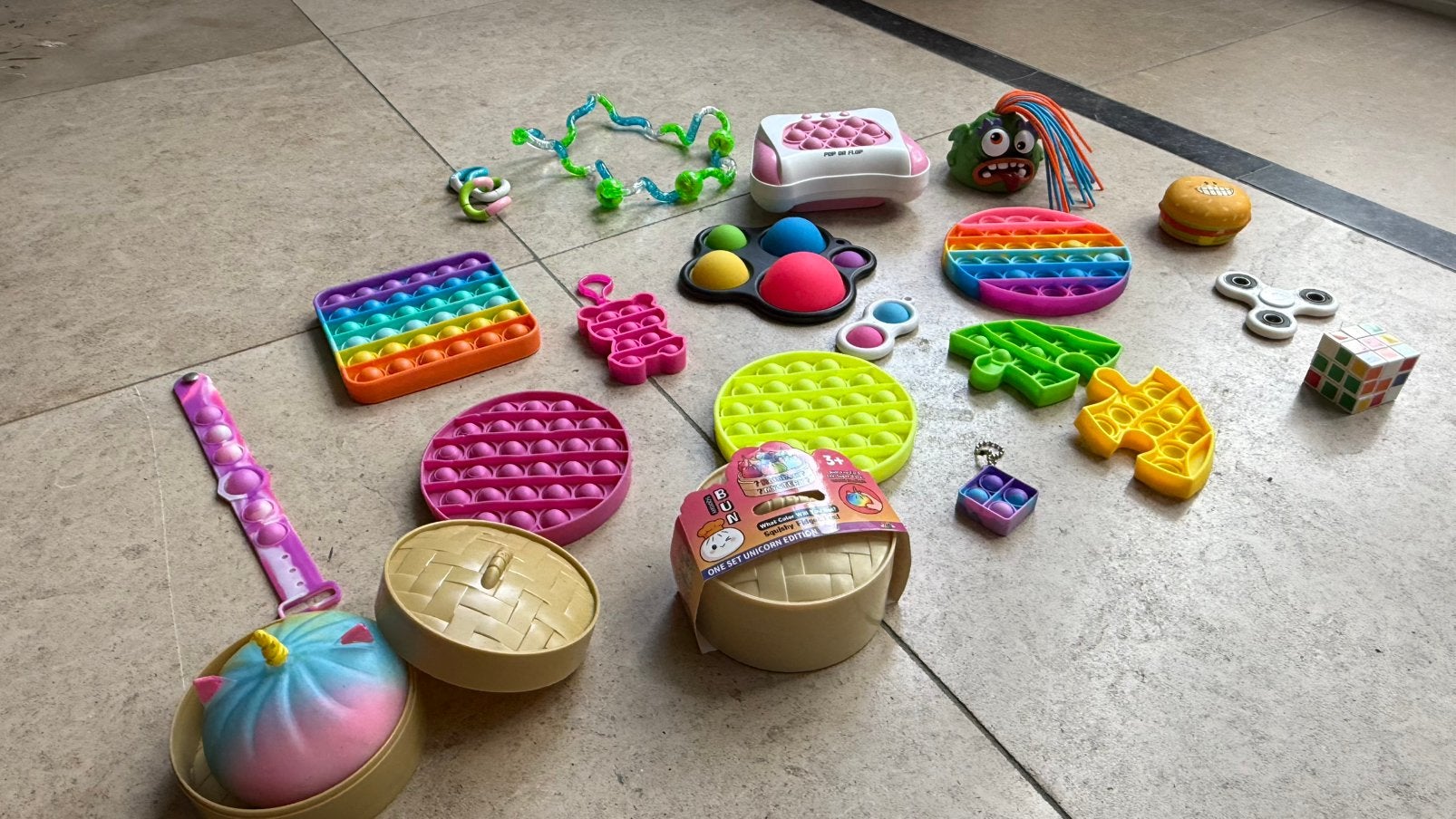 Collectie dumplings squishy, fidget toys en spinner, pop-its, Ophalen of Verzenden, Zo goed als nieuw