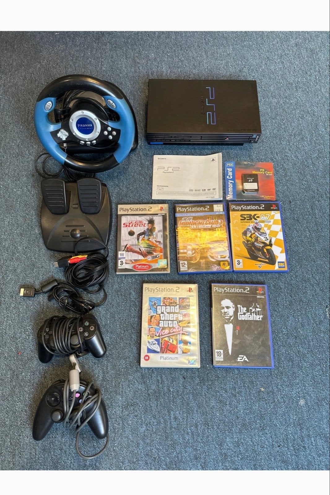 PlayStation 2 Bundel met Games, Stuur en Controllers, Spelcomputers en Games, Gebruikt, Vanaf 18 jaar, Racen en Vliegen, 2 spelers