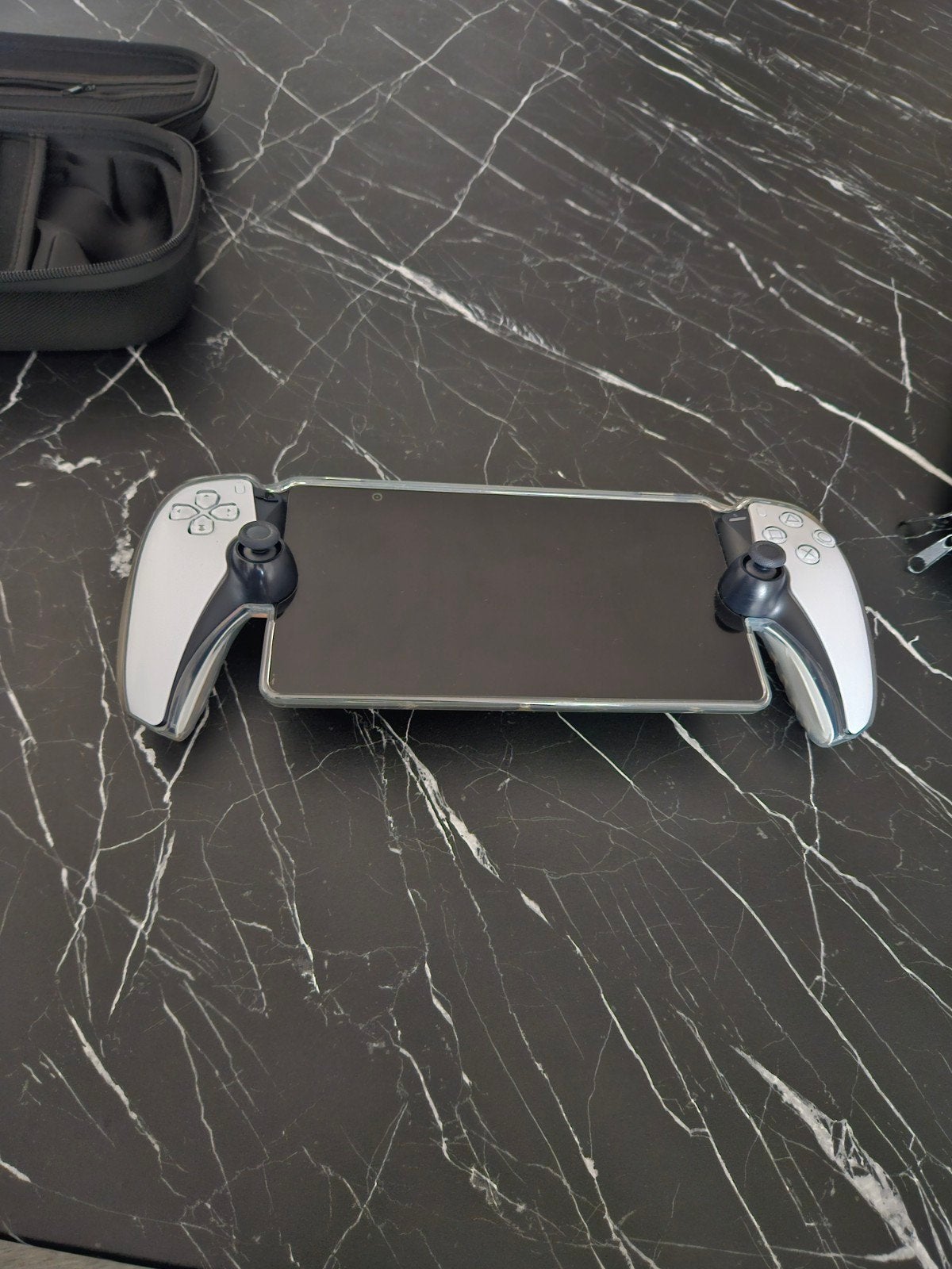Zo goed als nieuwe PlayStation Portal met hoes