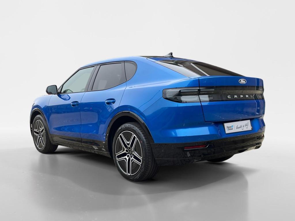 Ford Capri Premium Extended Range RWD 77 kWh | Nieuw te best, Auto's, Automaat, 12 maanden, Achterwielaandrijving, Blauw