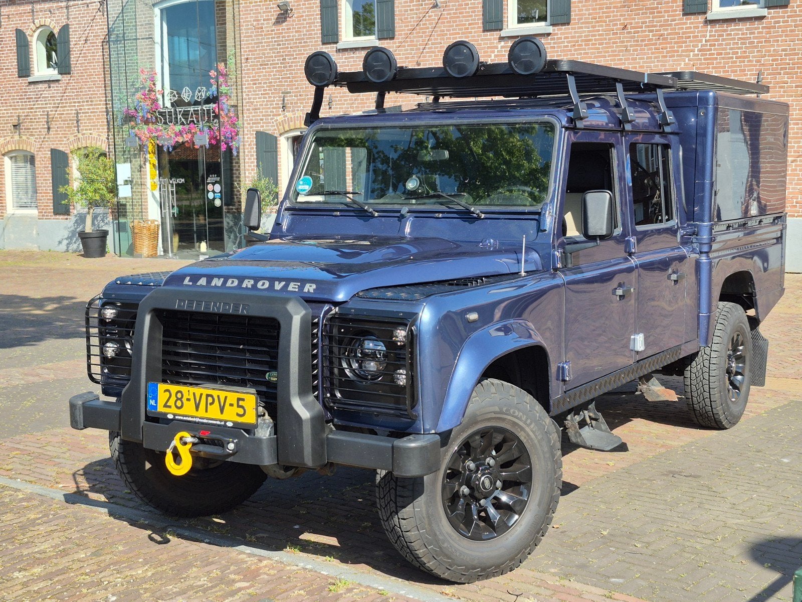 Foto 2 van Land Rover Defender 130 Crewcab PUMA DC 4WD 2008 + daktenten