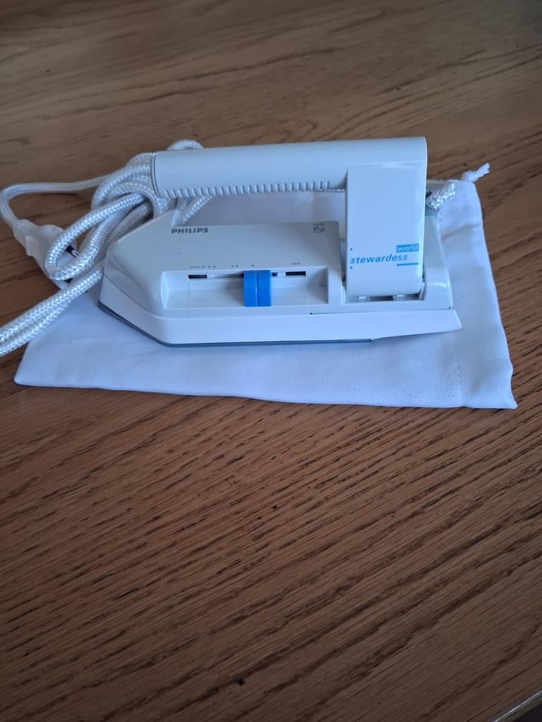 Reisstrijkijzer., Ophalen