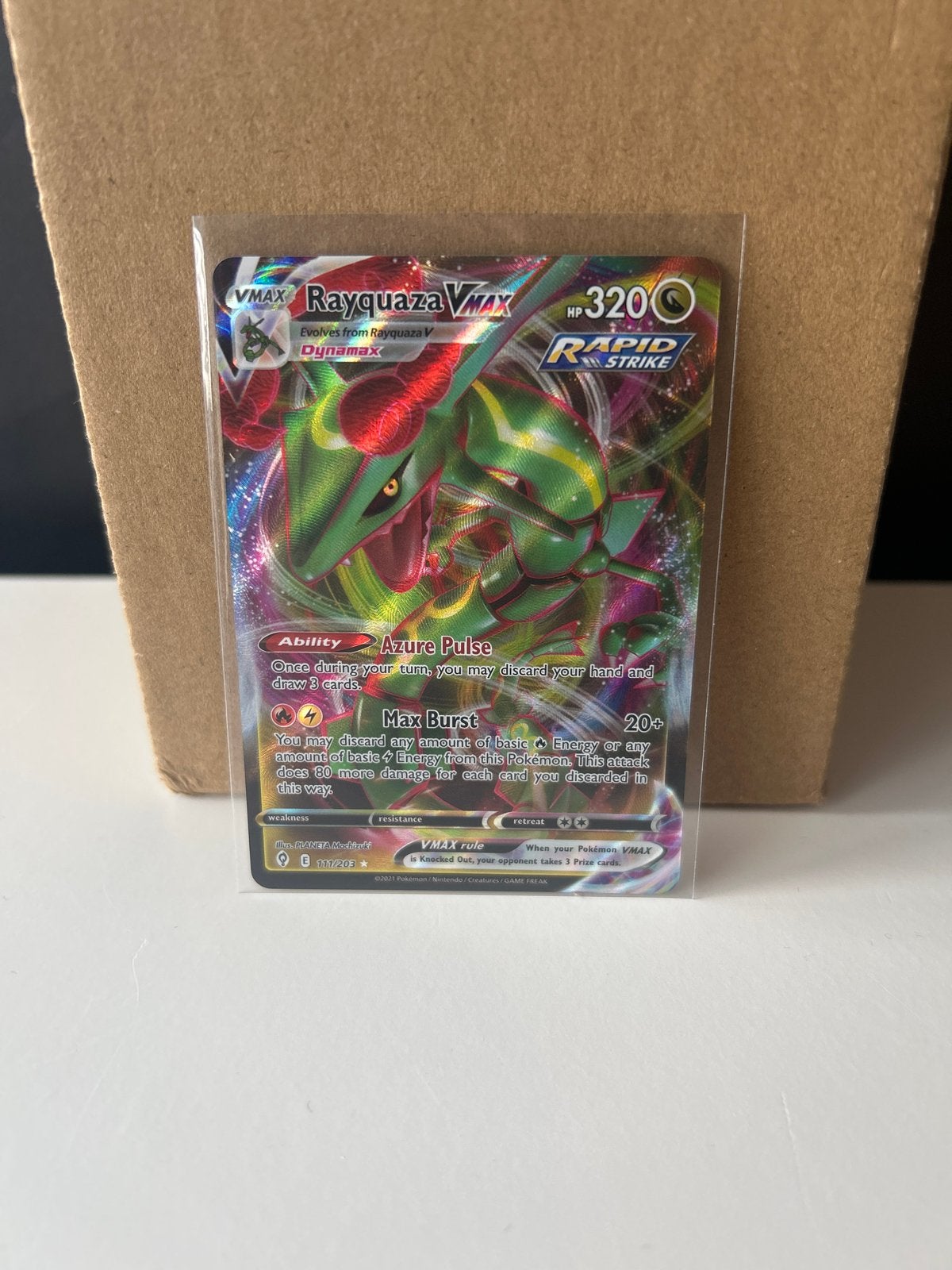 Pokémon Rayquaza VMAX 111/203 Evolving Skies, Ophalen of Verzenden, Zo goed als nieuw, Losse kaart