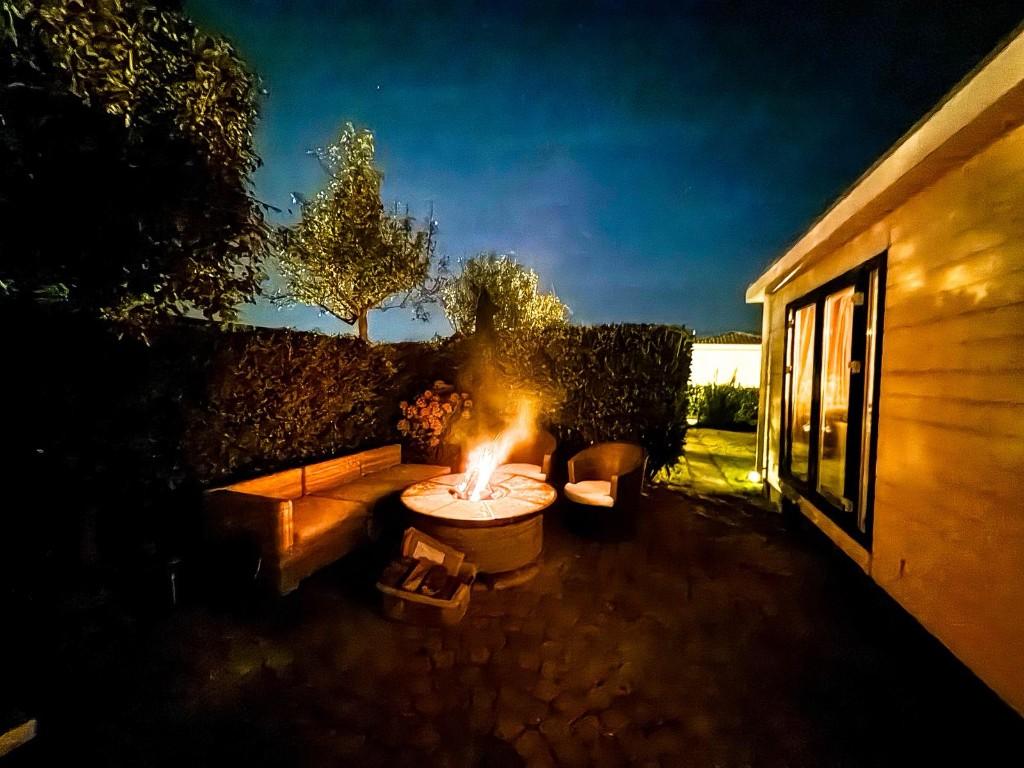 Tiny-huis met vuurplaats in Capfun de Bongerd, Open haard, Aan zee, Recreatiepark