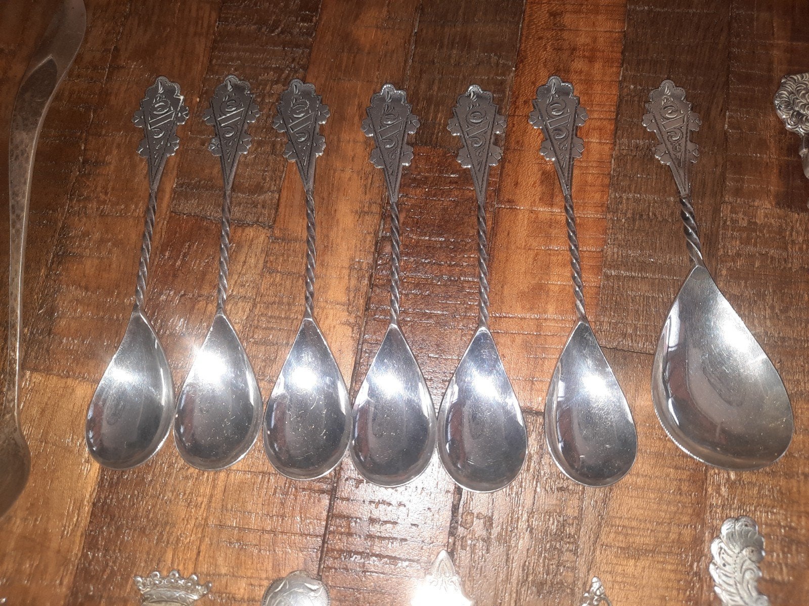 Set van 7 antieke zilveren lepels met gedraaide steel, Ophalen of Verzenden