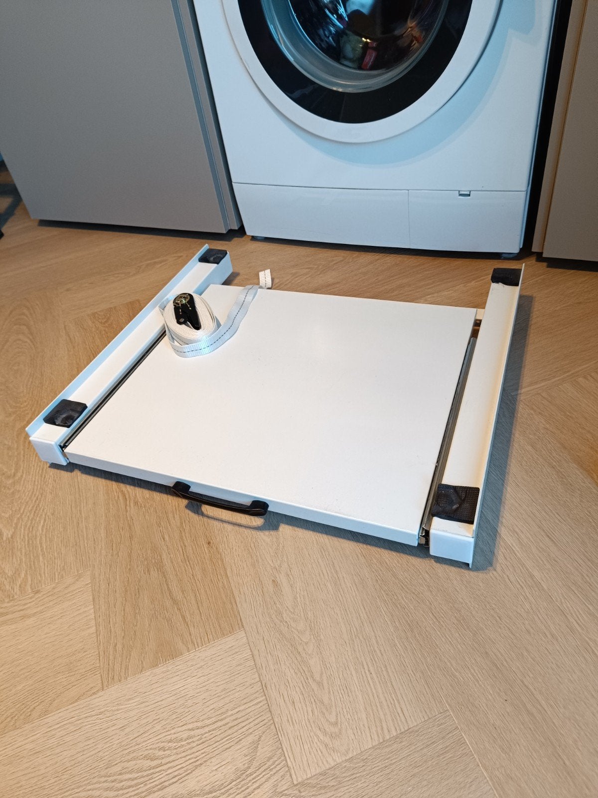 uitschuifbare Plateau wasmachine/droger, Ophalen
