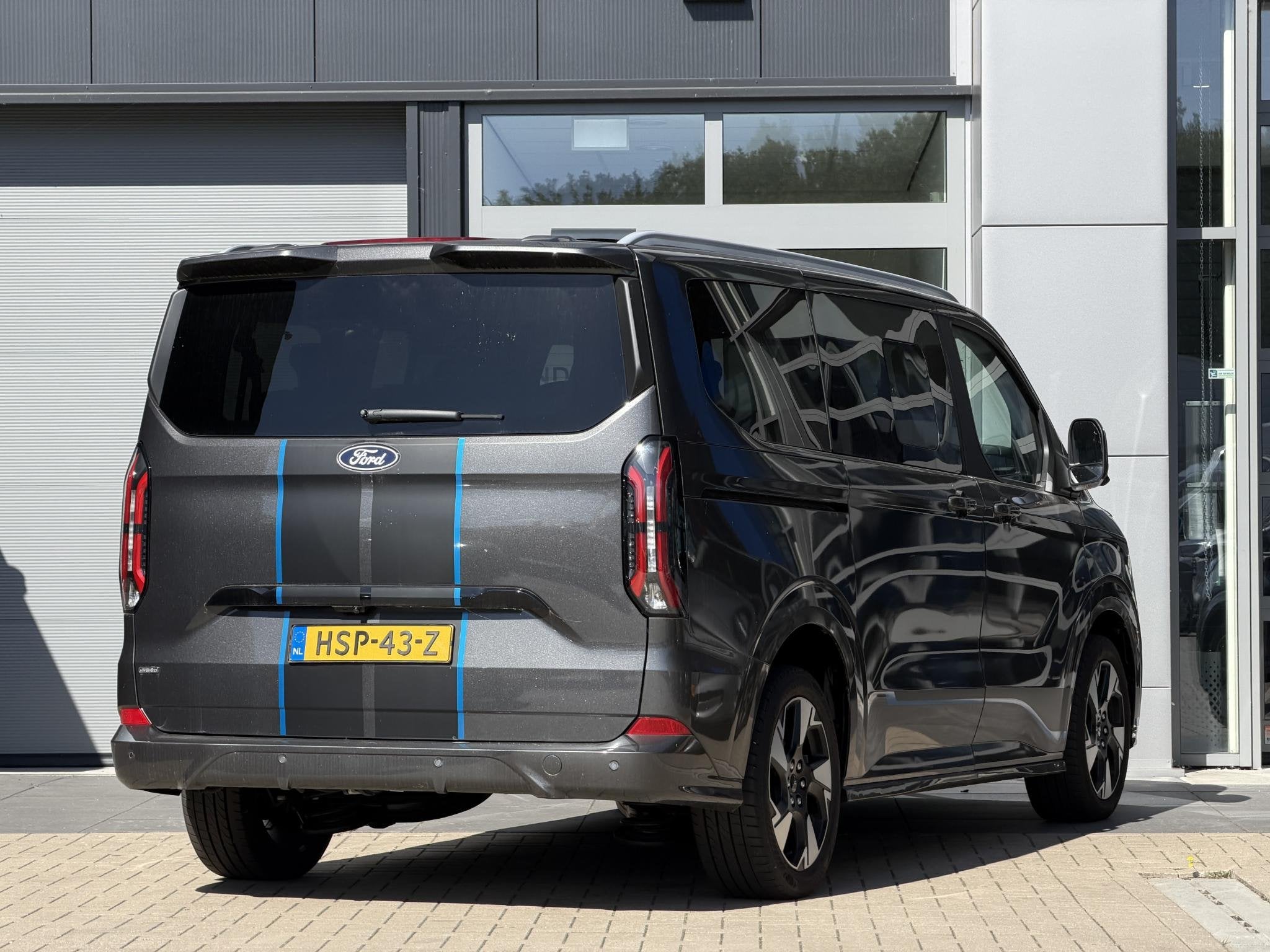 Ford Tourneo Custom PHEV 233PK L1 Sport | Geel kenteken | In, Auto's, 12 maanden, Gebruikt, Plug-in hybride, Bedrijf