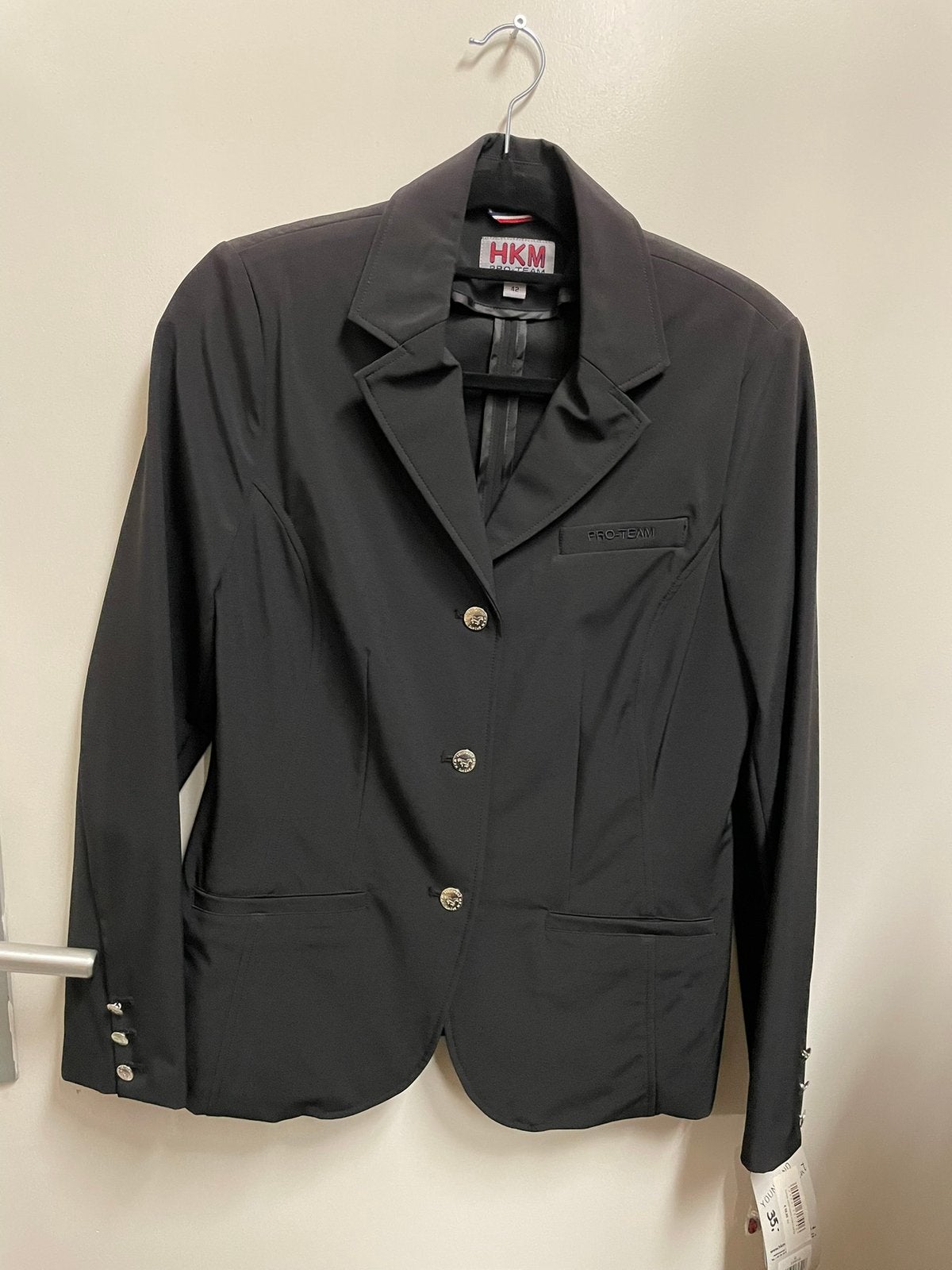 Hkm wedstrijdjasje maat 42 zwart nieuw van 59,95 nu 25,-, Dieren en Toebehoren, Paardrijkleding, Ophalen of Verzenden, Nieuw, Dressuur