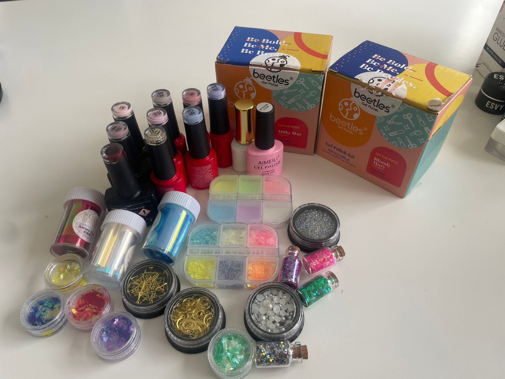 diverse gelnagellakken, glitter, bedeltjes, Ophalen of Verzenden, Gebruikt