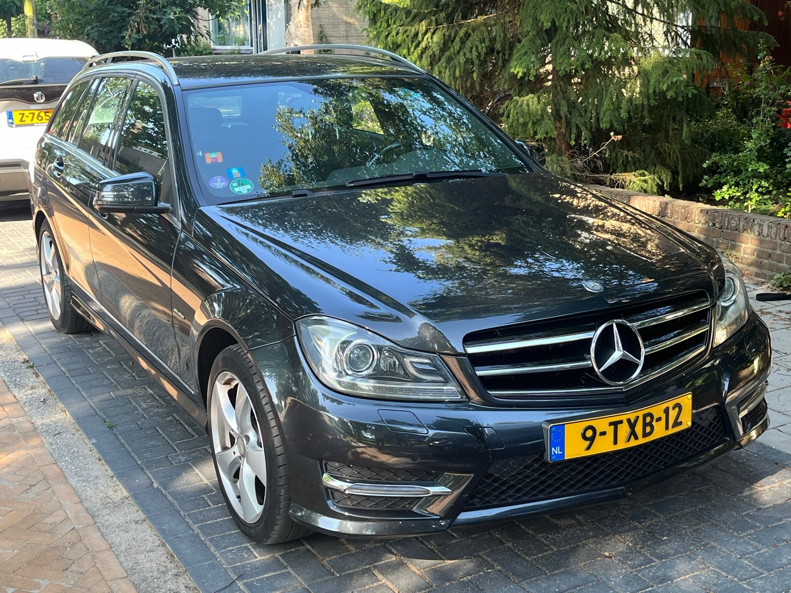 Mercedes-Benz C-Klasse C180 Blueefficiency Aut. 2014 Zwart, Auto's, Automaat, Achterwielaandrijving, 1800 kg, 1445 kg
