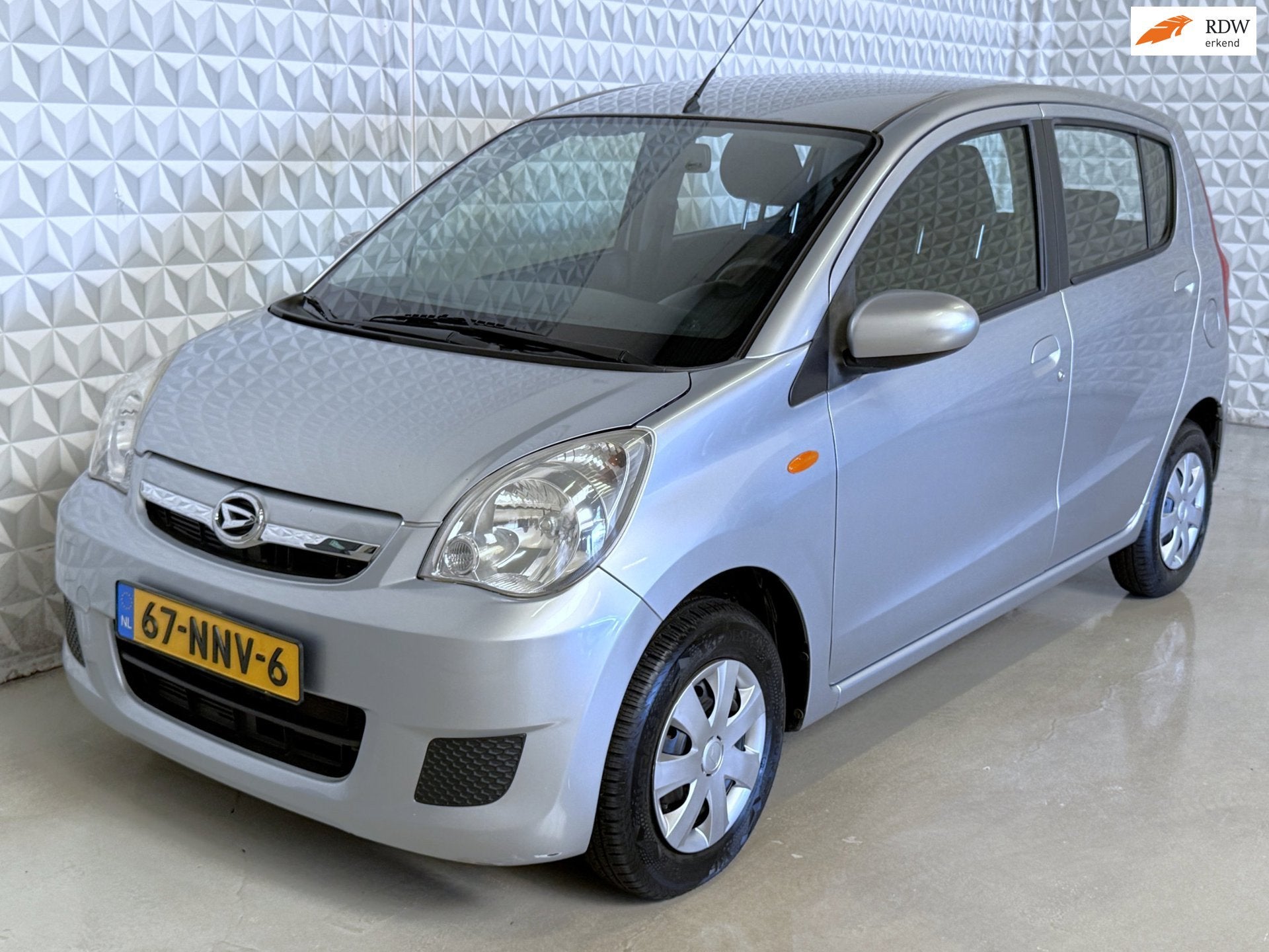 Daihatsu Cuore 1.0 Comfort Airco AUTOMAAT / 87.000km (2010), Auto's, Daihatsu, 18 €/maand, 4 stoelen, Cuore, Bedrijf