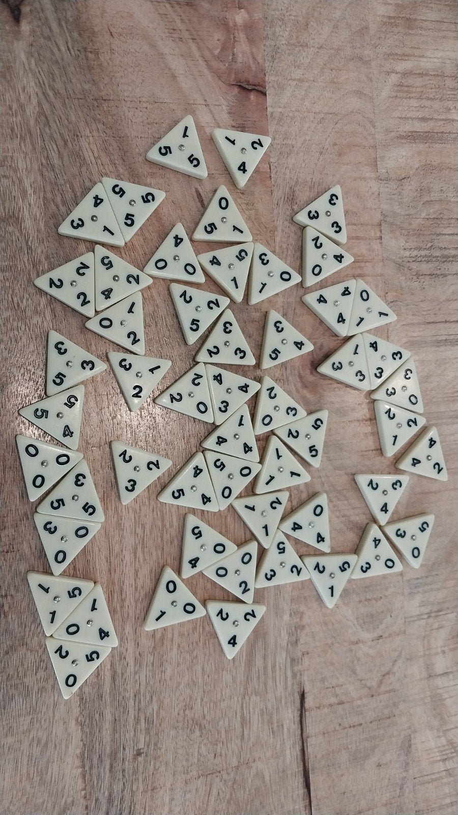 Triominos stenen, Ophalen