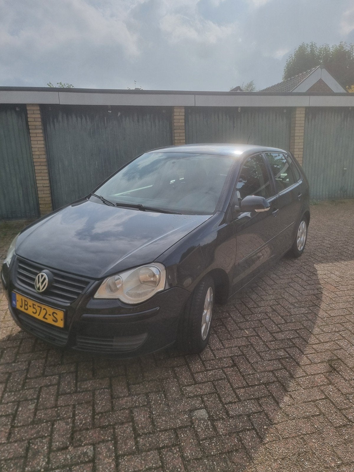 Volkswagen Polo 1.2 2005 Zwart 5 deurs Airco., Auto's, Voorwielaandrijving, 64 pk, 540 kg, 1198 cc