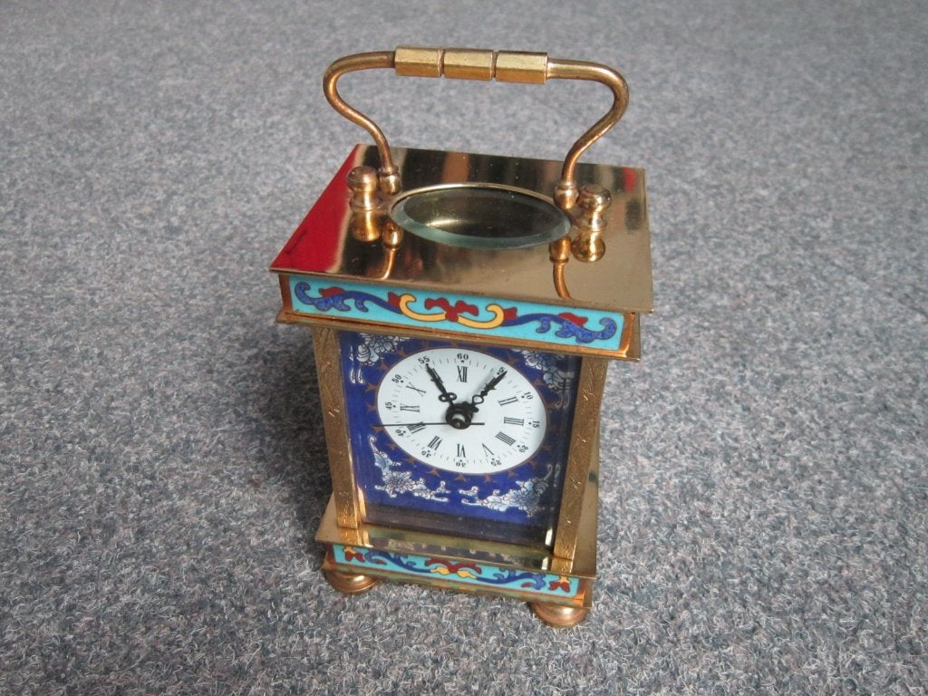 SIERLIJKE TAFELKLOK, Ophalen