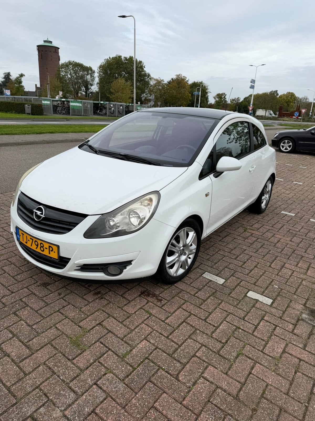 Opel Corsa 1.2 16V 3D 2009 Wit, Auto's, Voorwielaandrijving, 450 kg, 40 €/maand, 4 cilinders
