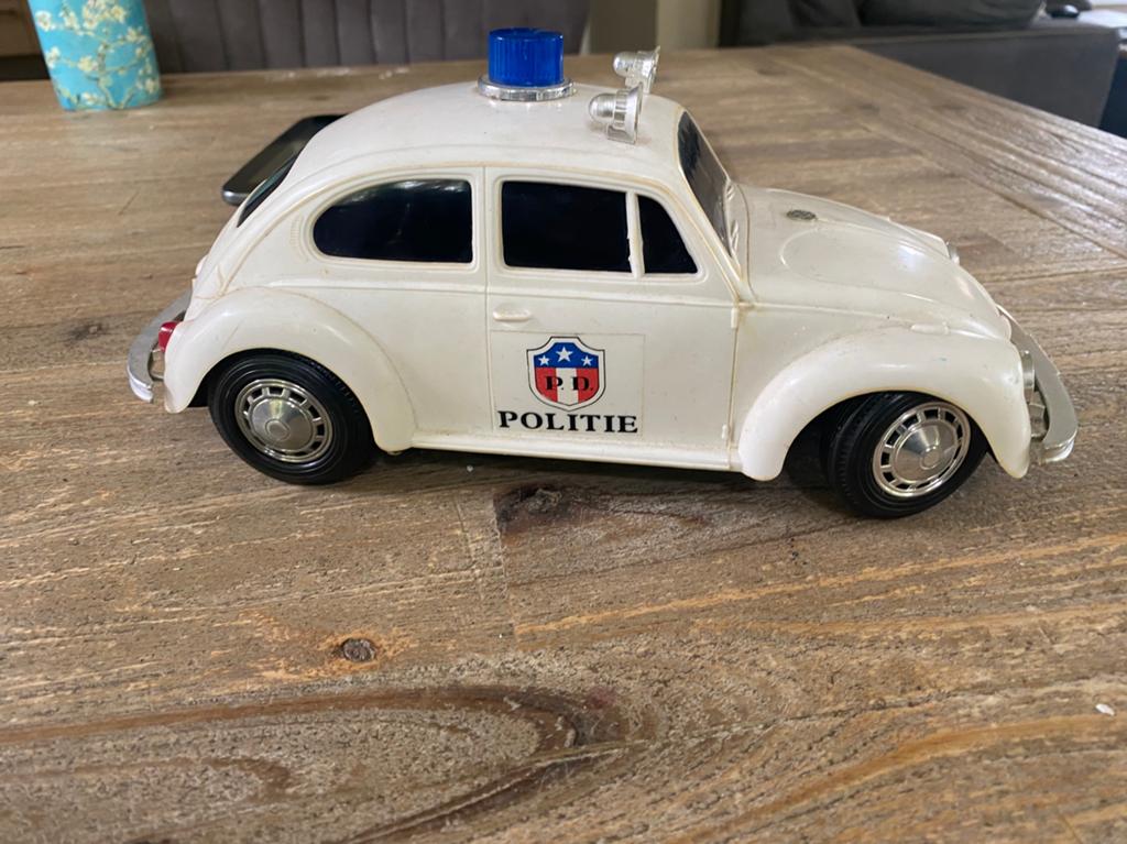 Vintage VW kever politie made in hong kong, Antiek en Kunst, Antiek | Speelgoed, Ophalen of Verzenden