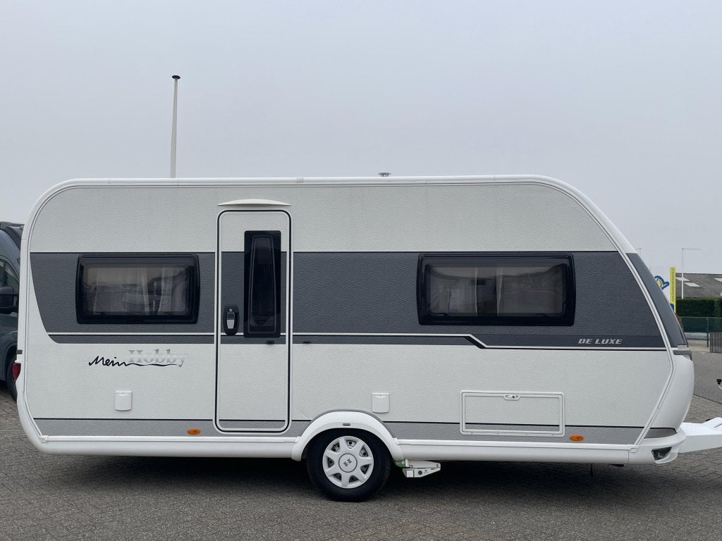 Hobby De Luxe 460 UFE MOVER/VOORTENT/NIEUWSTAAT, Caravans en Kamperen, Hobby, Bedrijf, 4 tot 5 meter, Tot en met 4