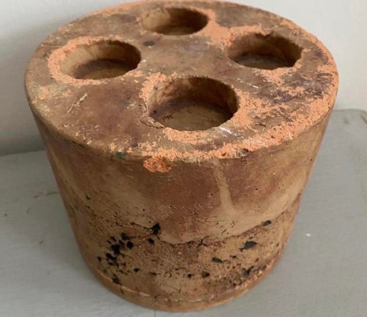 Antieke terracotta waxinelicht, Ophalen