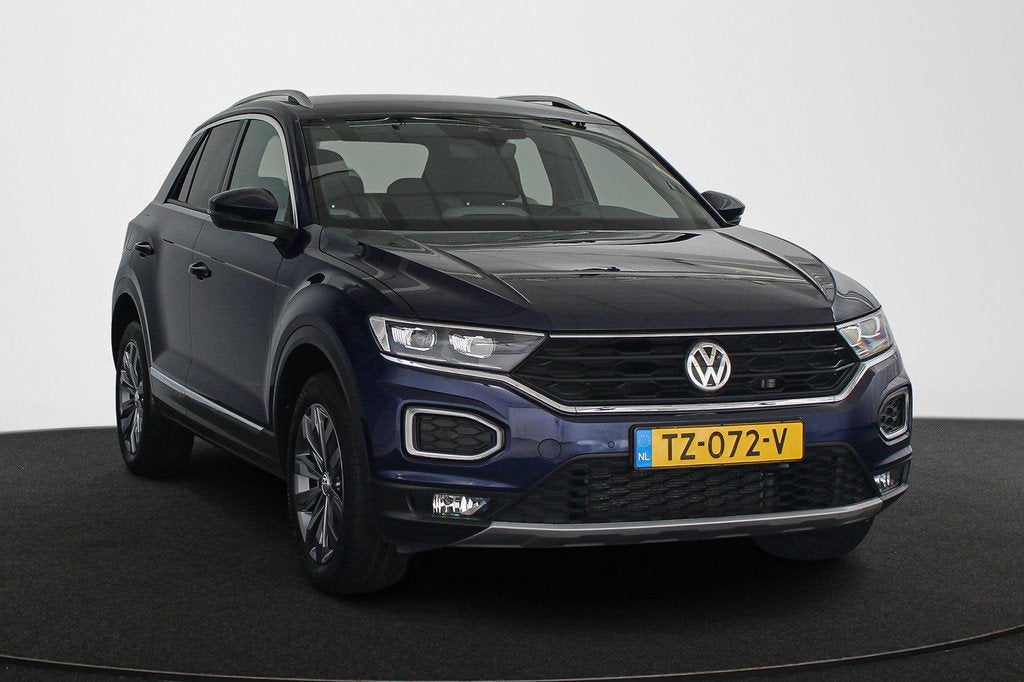 Volkswagen T-Roc 1.0 TSI Sport NL Auto Navigatie LED Koplamp, Voorwielaandrijving, Stof, Gebruikt, Blauw