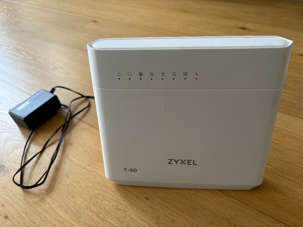 Zyxel VMG8825-T50 modem router WiFi AC2400 Odido T-Mobile, Ophalen of Verzenden