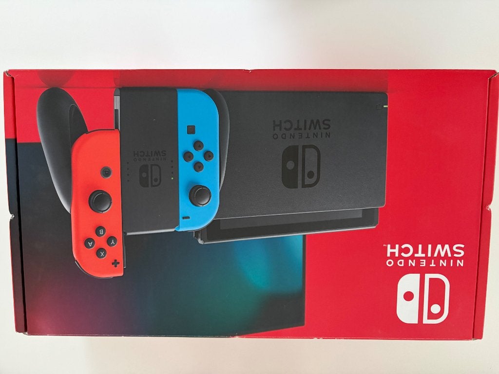 Nintendo switch met doos+Mario hoes+Extra controller+Oplader, Ophalen, Zo goed als nieuw, Met 3 controllers of meer, Switch Original