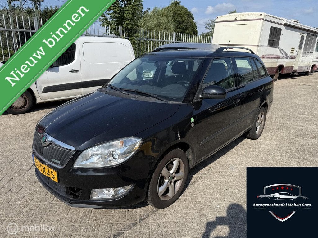 Skoda Fabia Combi 1.2 TDI Greenline Airco Export, Auto's, Skoda, Euro 5, Stof, Zwart, 1199 cc
