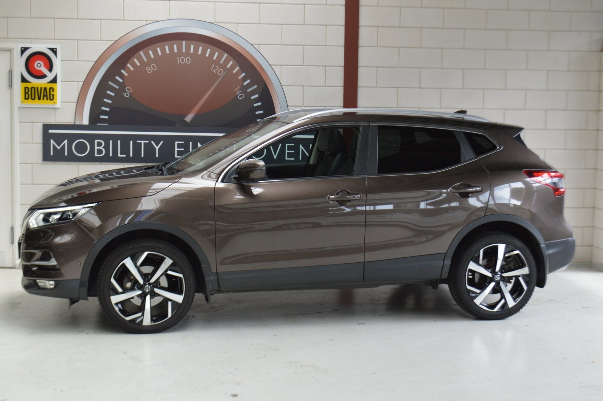 Nissan Qashqai 1.2 Tekna, Trekhaak, All-season, Panorama, NI, Auto's, Nissan, Voorwielaandrijving, Gebruikt, 4 cilinders, Bruin