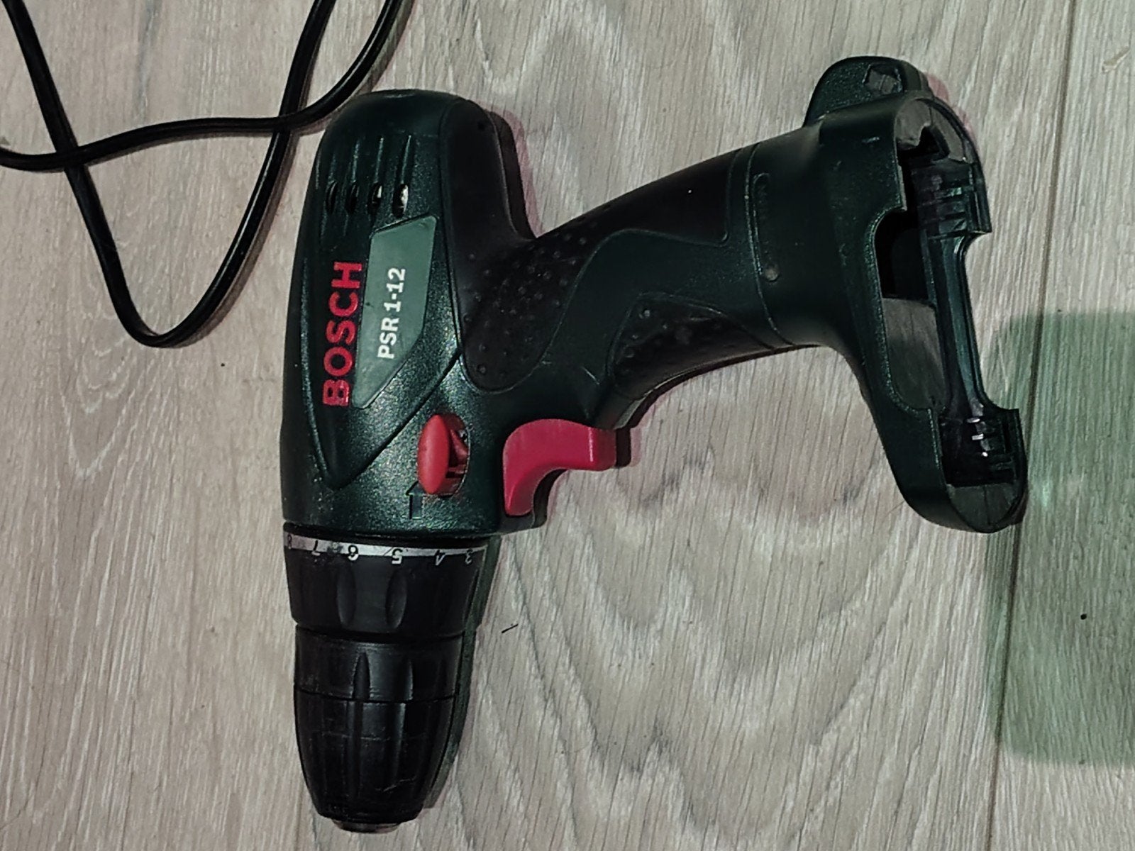 Bosch PSR 1-12 Accuboormachine met lader en 2 accu's, Gebruikt, Variabele snelheid, Ophalen of Verzenden, Boor- en Schroefmachine