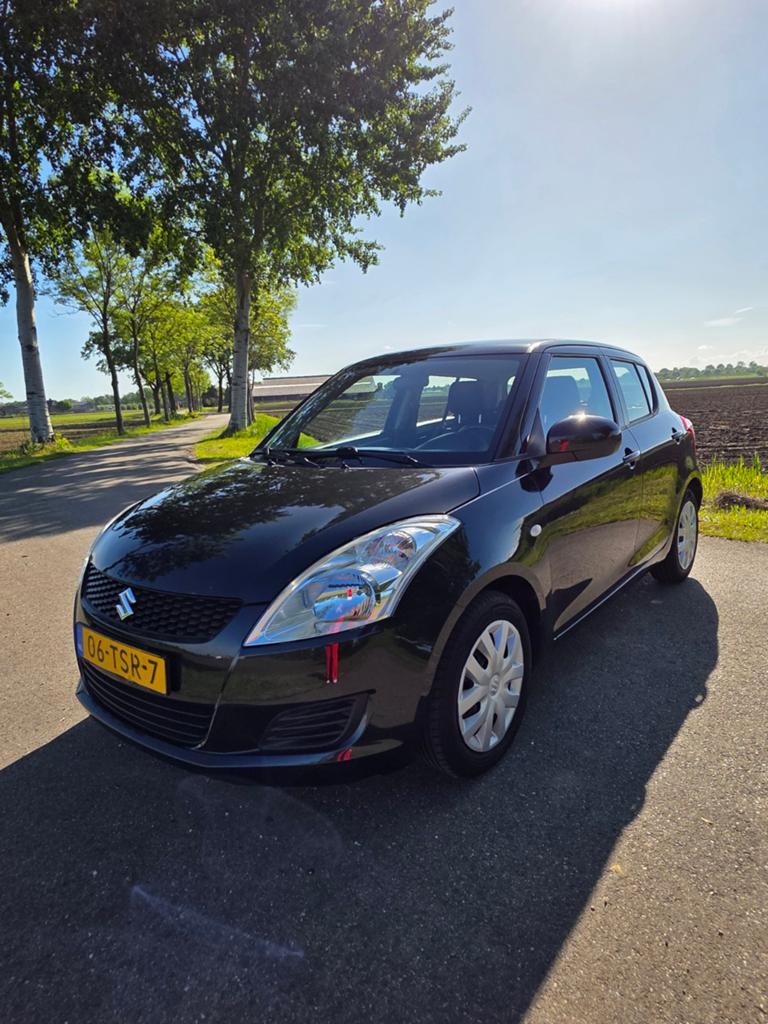 Goed onderhouden Suzuki Swift 1.2 hatchback 5-D 2012 Zwart, Auto's, Suzuki, Voorwielaandrijving, 4 cilinders, 400 kg, Origineel Nederlands