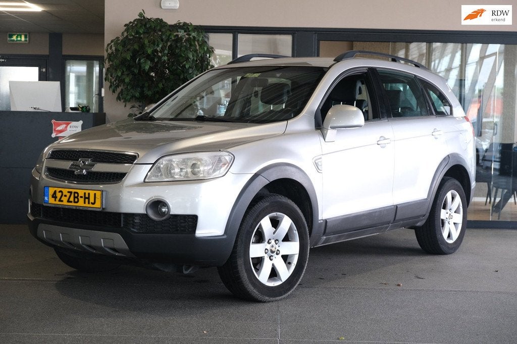 Chevrolet Captiva 2.4i Style 2WD Leder Trekhaak Pdc Airco CV, Auto's, Chevrolet, Voorwielaandrijving, 136 pk, Gebruikt, Zwart