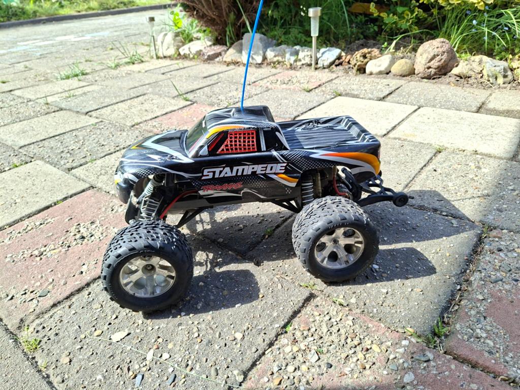 Traxxas Stampede 2WD compleet met zender, 2 accu's en lader, Ophalen of Verzenden