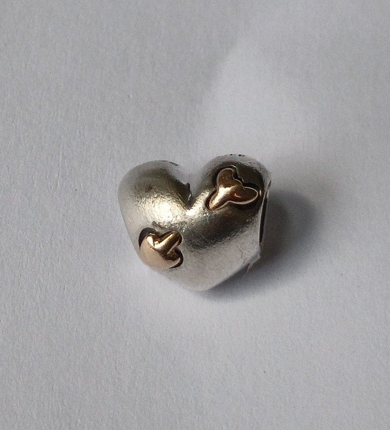 Pandora bedel zilver met gouden pijltjes, Sieraden, Tassen en Uiterlijk, Bedels, Pandora, Ophalen of Verzenden, Zo goed als nieuw
