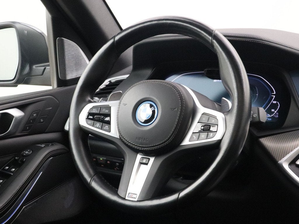 BMW X5 xDrive45e High Executive M-Sport SoH 95% (bj 2022), Auto's, BMW, Gebruikt, 398 pk, Met garantie (alle), Blauw