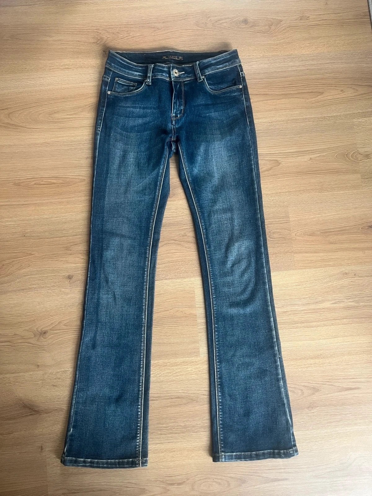 Vintage Flared Jeans size 38, Kleding | Dames, Vintage Dressing, Ophalen of Verzenden, Nieuw, Blauw
