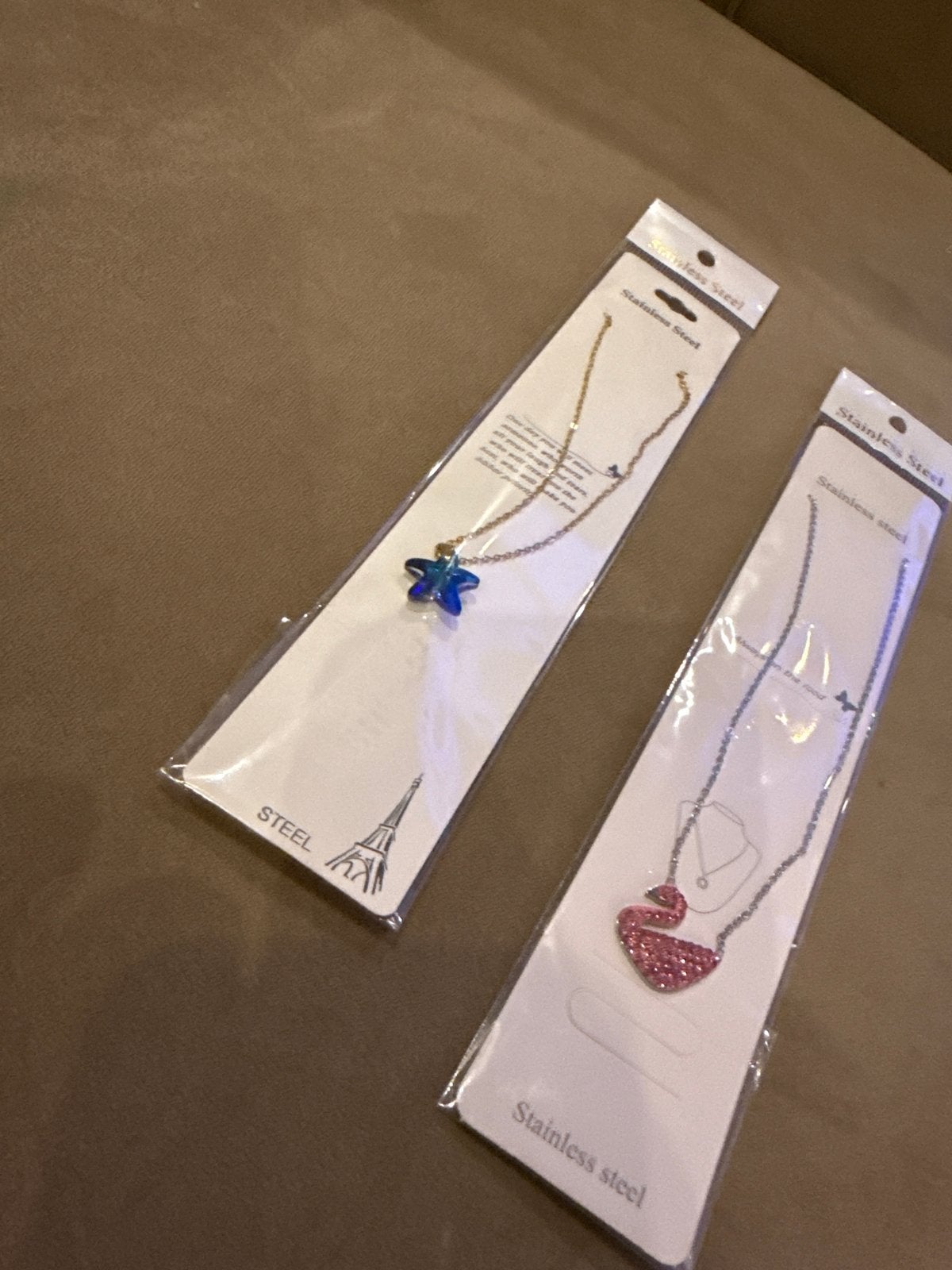 Roze Zwaan Ketting & Blauwe Ster Ketting - RVS, Met kristal, Overige materialen, Nieuw, Ophalen of Verzenden