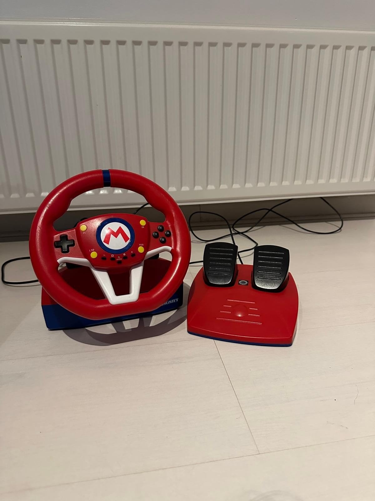 Mariokart racing wheel pro mini, Spelcomputers en Games, Ophalen of Verzenden, Zo goed als nieuw, Switch, Stuurtje of Sportattribuut
