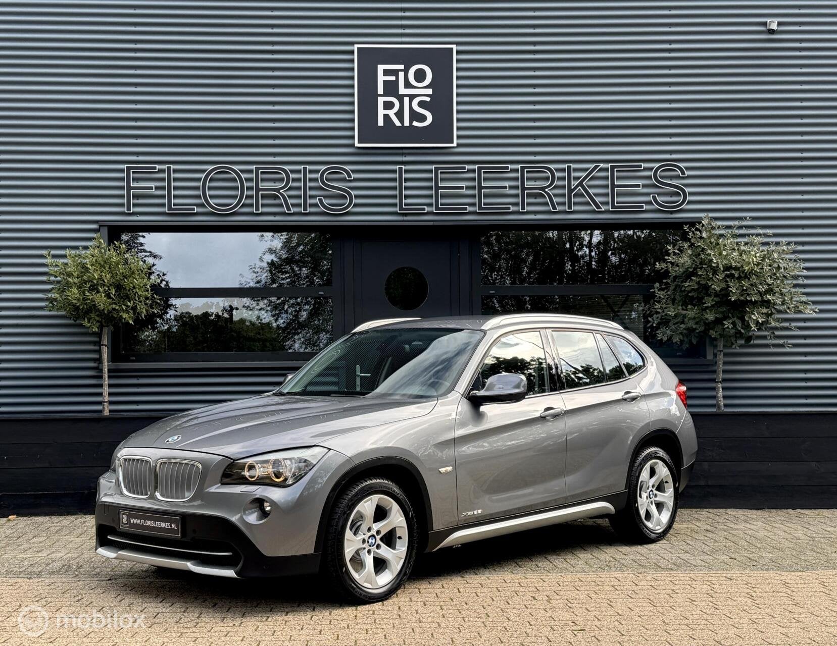 BMW X1 xDrive28i | 6 Cilinder | Zwart Leer | Xenon | Navi, Auto's, Gebruikt, 258 pk, 2996 cc, Bedrijf