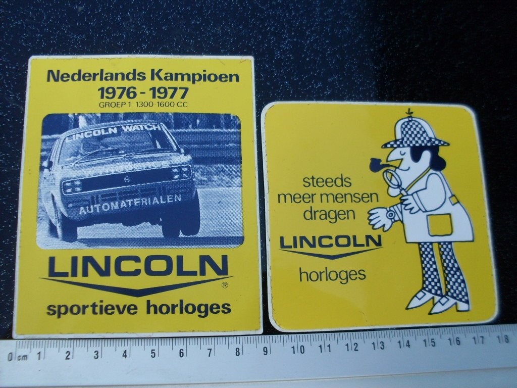 2x sticker Lincoln horloges logo 1976 autocross, Verzenden, Zo goed als nieuw, Merk