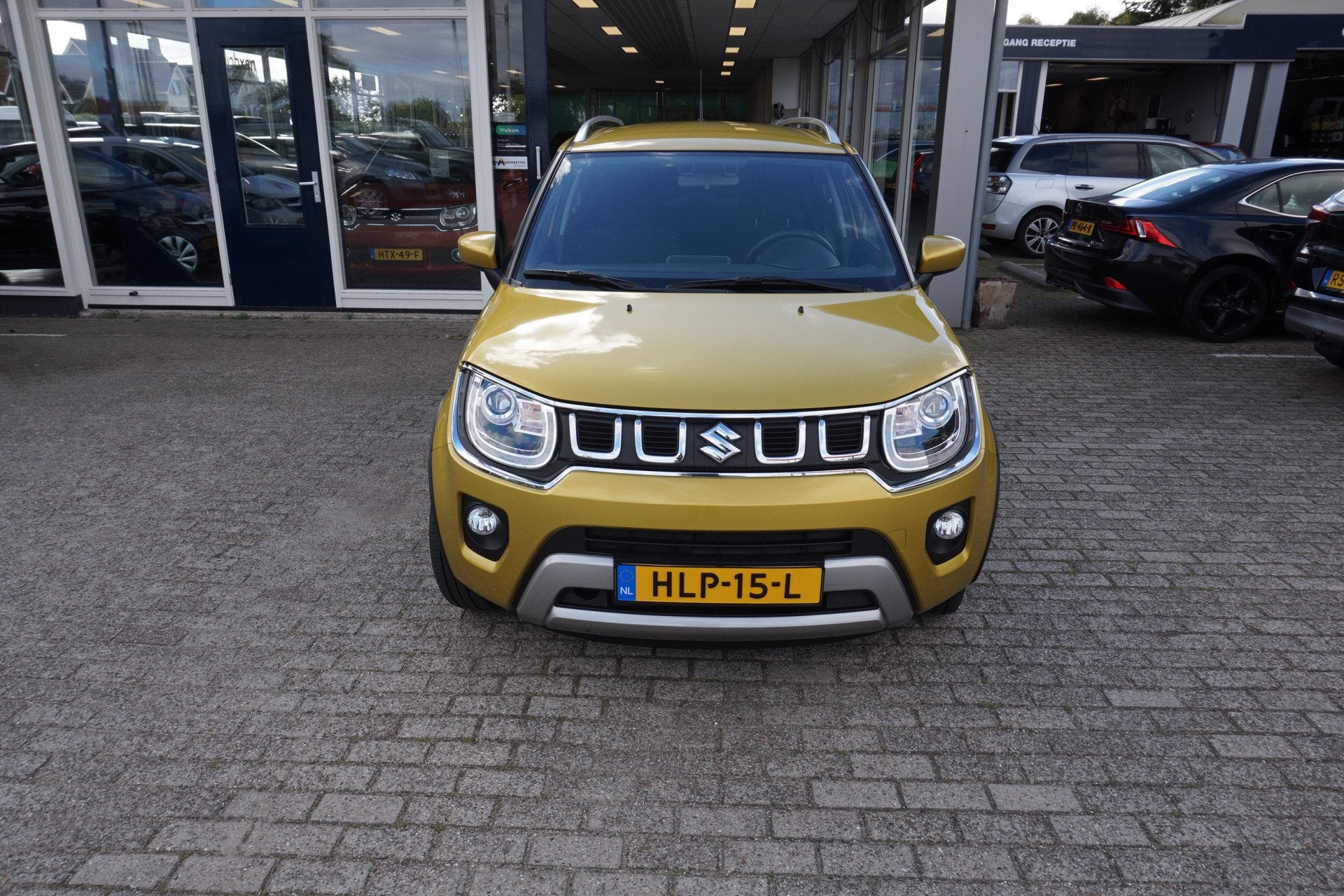 Suzuki Ignis 1.2 Smart Hybrid Style Automaat Incl nw apk/beu, Auto's, Stof, Gebruikt, 4 cilinders, Geel