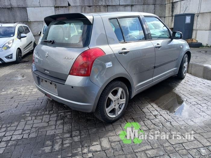 Stijl midden-rechts van een Suzuki Swift (ZCD), Gebruikt, -, -, Ophalen of Verzenden