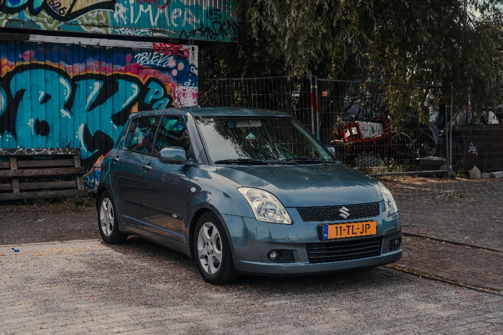 Suzuki Swift 1.3 5DRS 2006 Grijs, Voorwielaandrijving, Stof, 40 €/maand, 965 kg