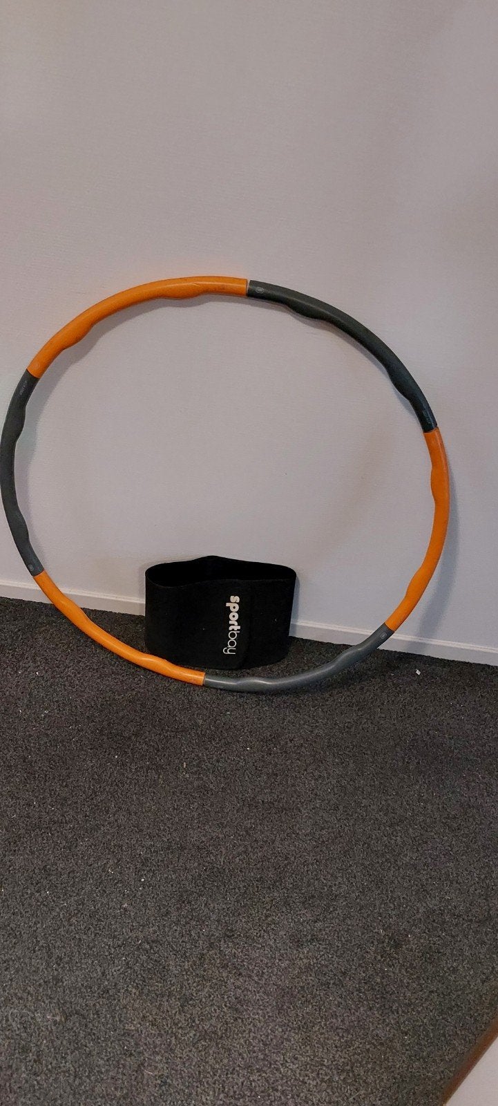 Sport hoelahoep met beschermband, Ophalen