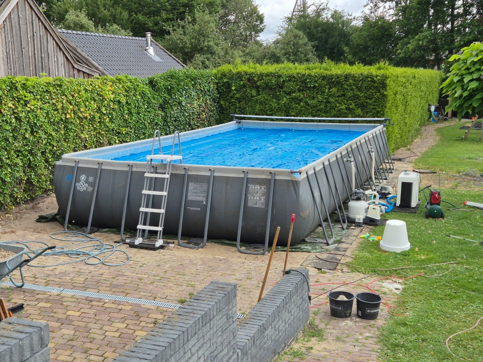 Intex  Ultra XTR Zwembad 9.75 x 4.88 x 1.32m met warmtepomp, 200 tot 300 cm, Rechthoekig, Ophalen, 120 cm of meer