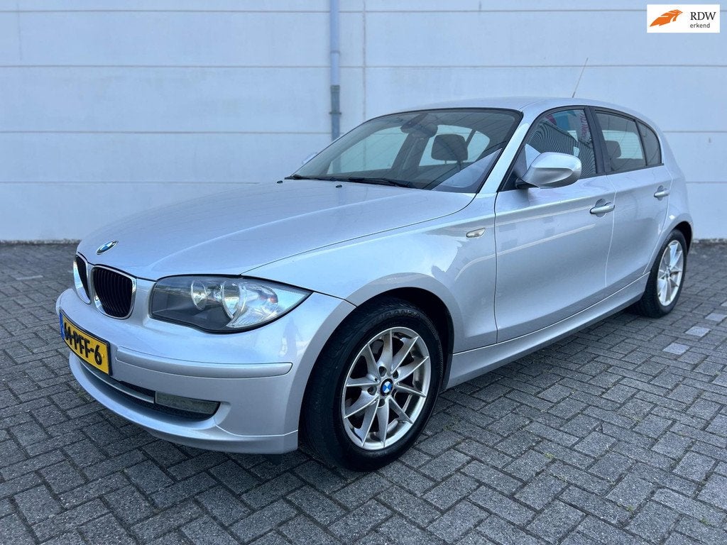 BMW 1-serie 118i Business Line Cruise Contole, Climat Contro, Auto's, BMW, 1-Serie, Euro 5, Zwart, Origineel Nederlands