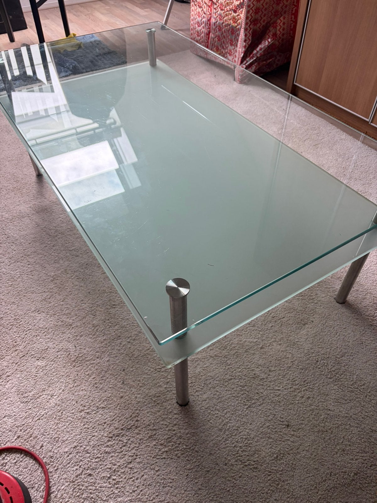 Glazen salontafel met RVS poten, Ophalen, 100 tot 150 cm, 50 tot 100 cm, Zo goed als nieuw