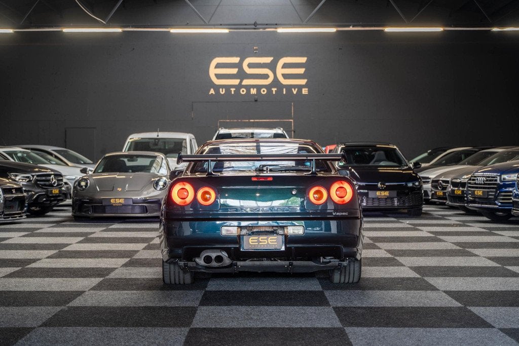Nissan Skyline R34 GTR V-spec Midnight Purple II, Auto's, Stof, Gebruikt, Zwart, Overige kleuren