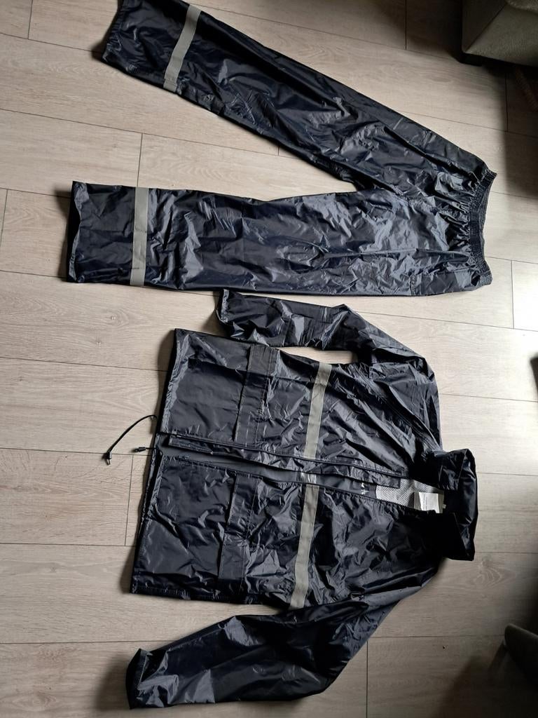 Donkerblauw regenpak met reflecterende strepen maat S., Ophalen